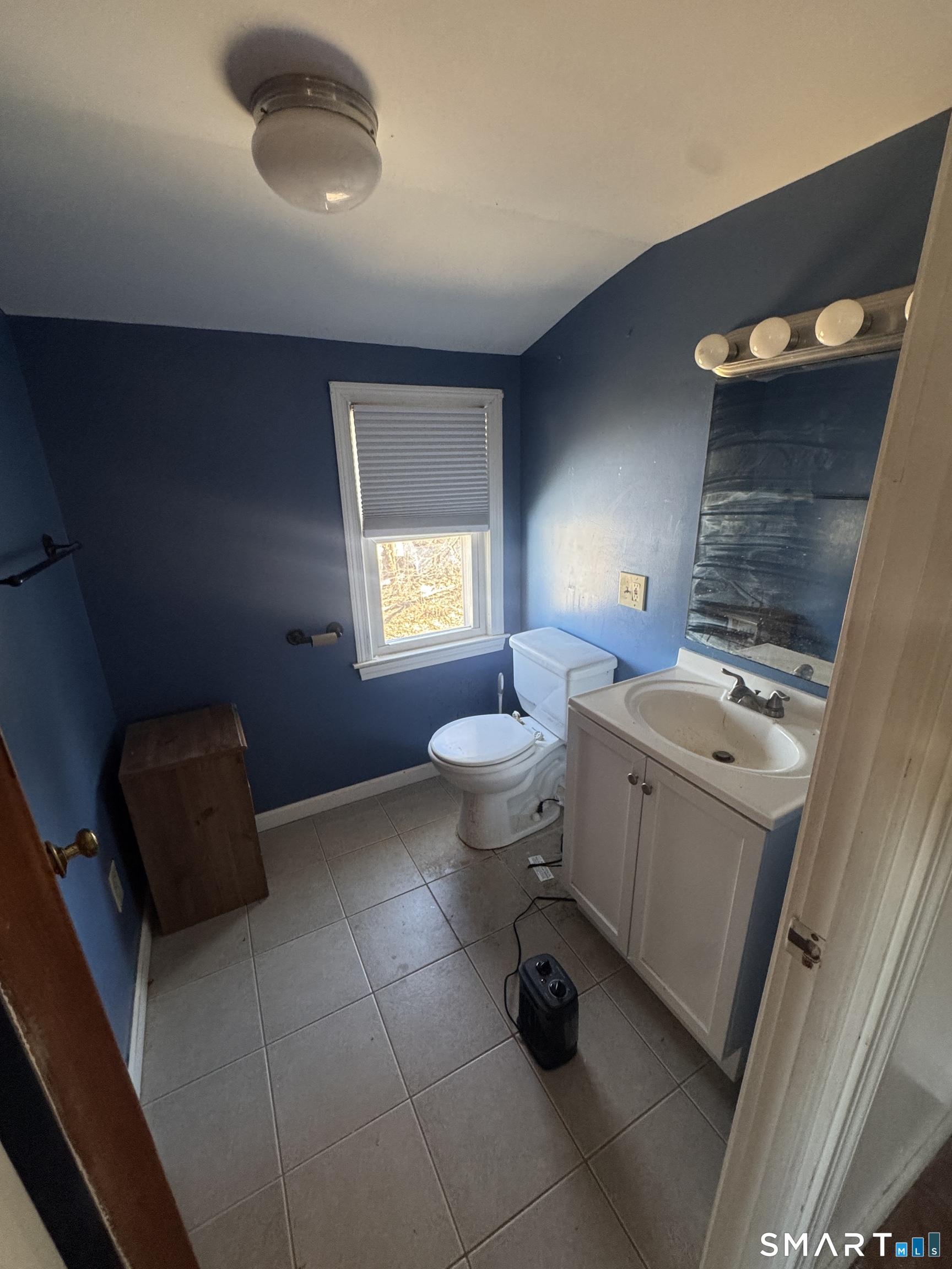 105 Crown Street Bristol, CT 06010 - Photo 14 of 20 a view of bathroom with a sink toilet and a tub