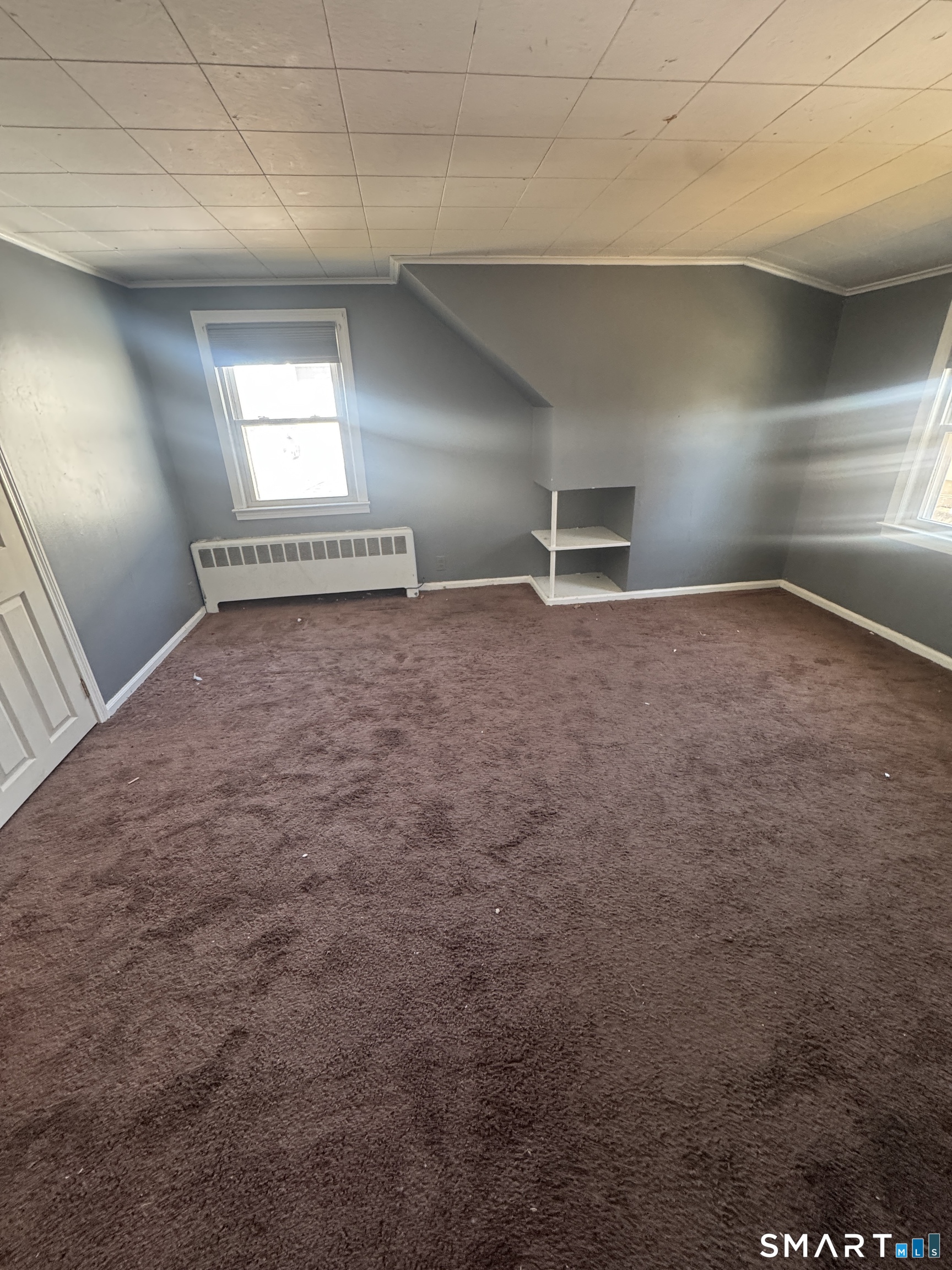 105 Crown Street Bristol, CT 06010 - Photo 18 of 20 a view of empty room with windows