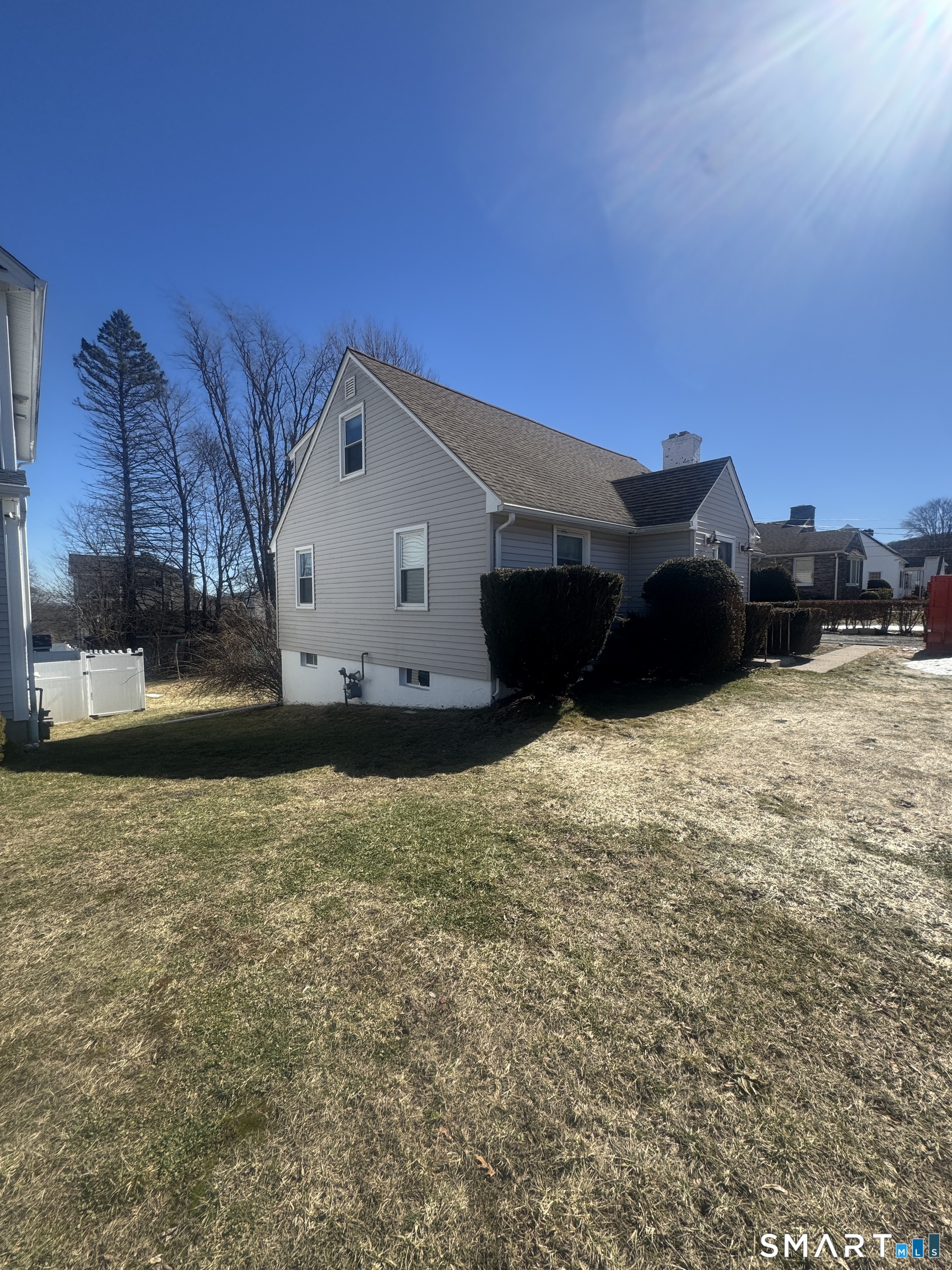 105 Crown Street Bristol, CT 06010 - Photo 3 of 20 a front view of a house with a yard