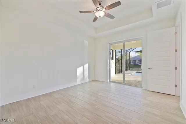 a view of an empty room and window