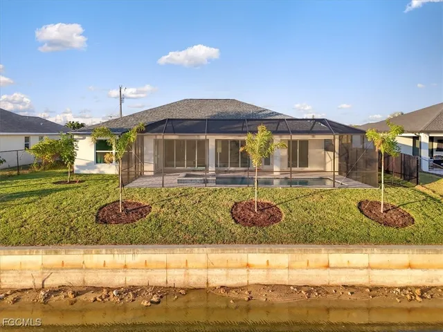 a view of a house with swimming pool