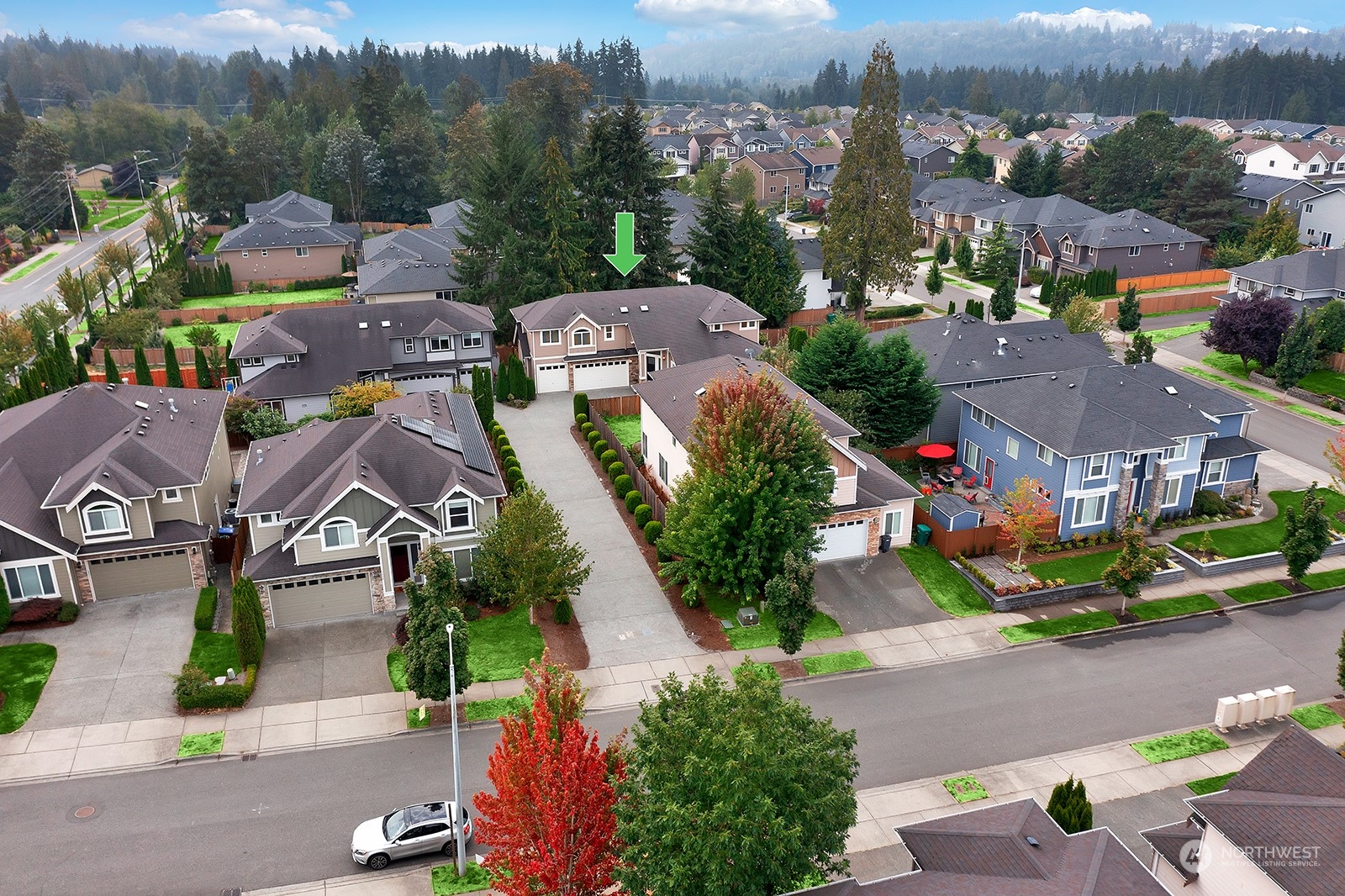 3818 222nd Place Southeast Bothell, WA 98021 - Photo 3 of 23 an aerial view of residential houses with outdoor space