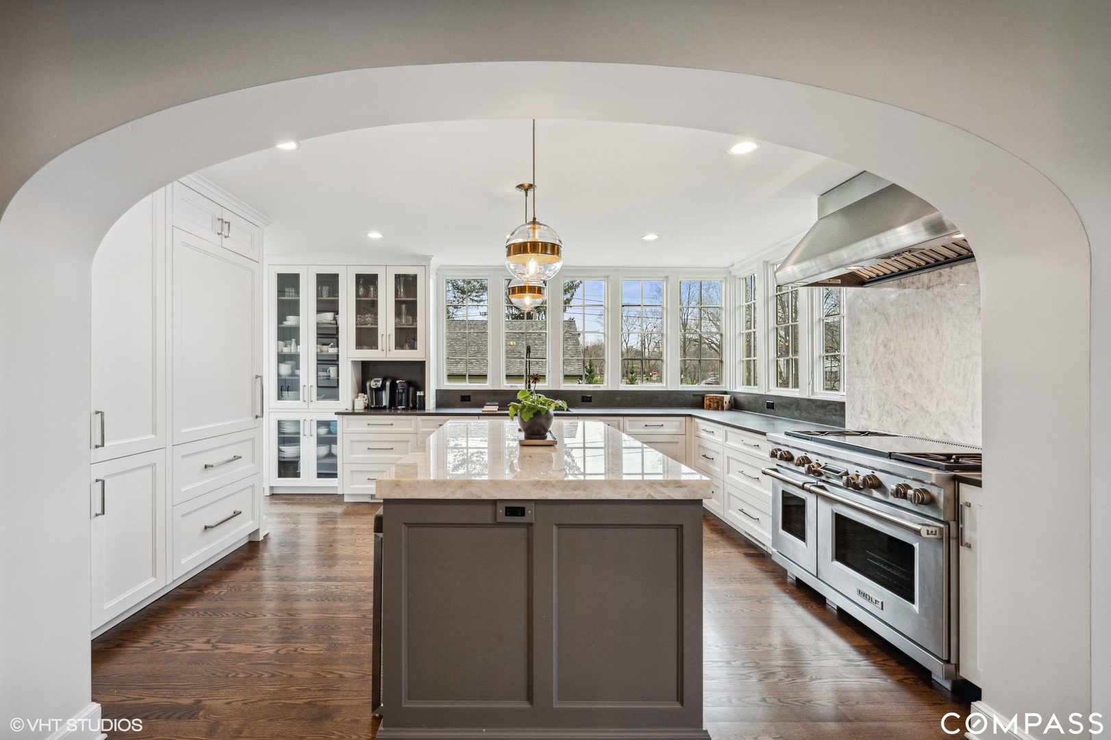 460 Berkeley Avenue Winnetka, IL 60093 - Photo 17 of 45 a kitchen with stainless steel appliances granite countertop a sink and cabinets