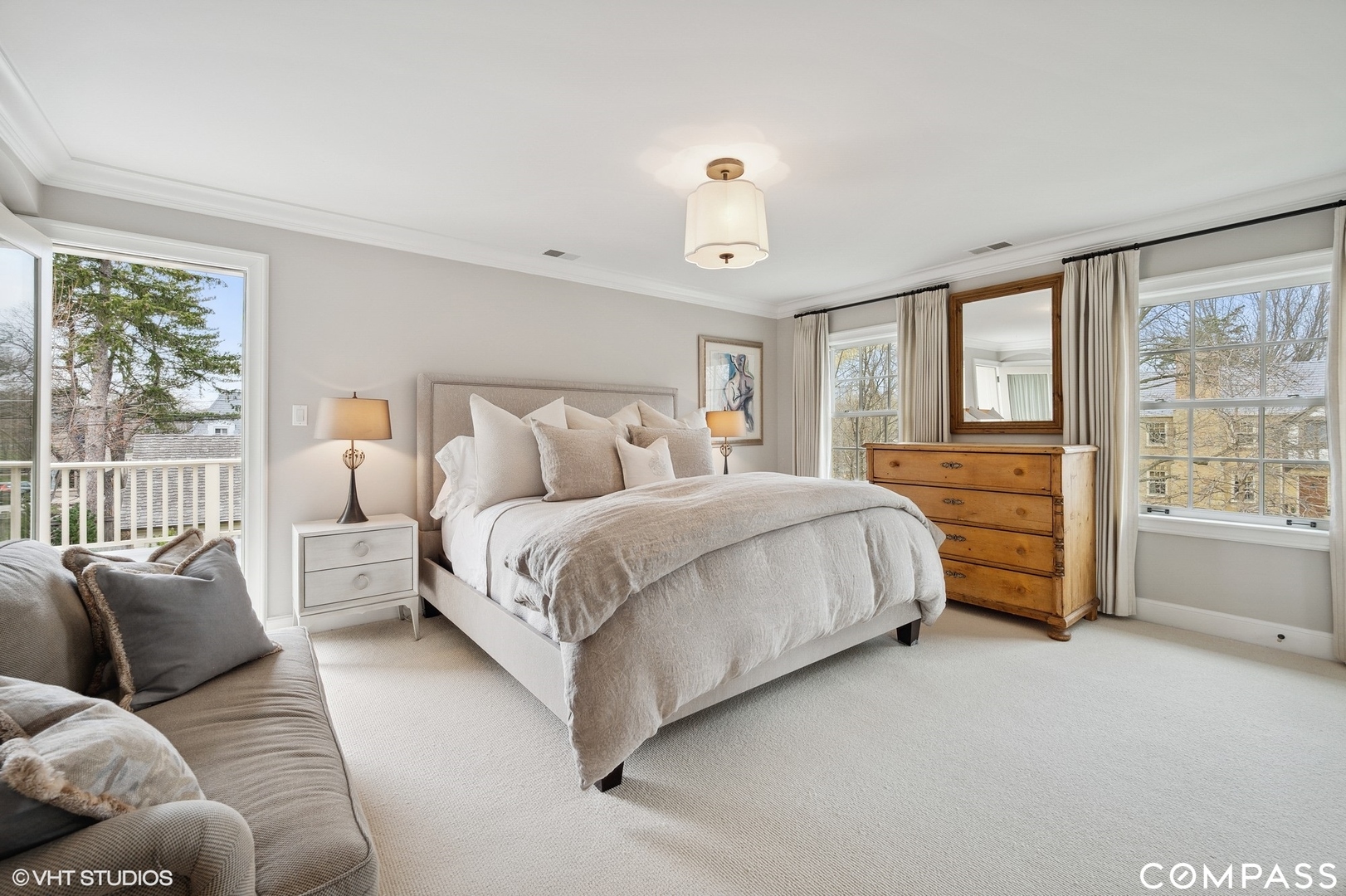 460 Berkeley Avenue Winnetka, IL 60093 - Photo 25 of 45 a spacious bedroom with a bed and a large window