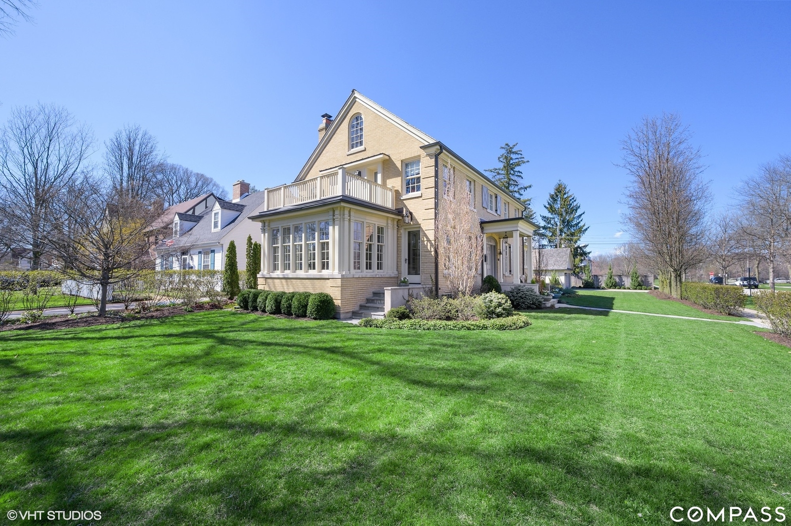 460 Berkeley Avenue Winnetka, IL 60093 - Photo 5 of 45 a view of a house with a big yard and large trees