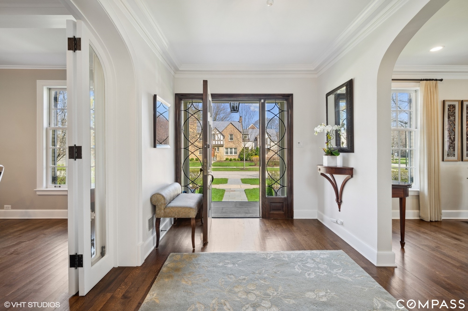 460 Berkeley Avenue Winnetka, IL 60093 - Photo 6 of 45 a view of a hallway with wooden floor and windows