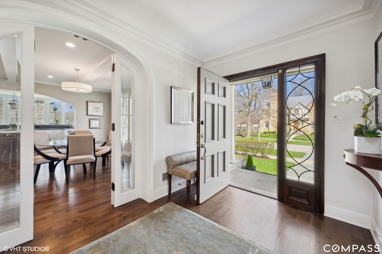 460 Berkeley Avenue Winnetka, IL 60093 - Photo 8 of 45 a living room with furniture and a floor to ceiling window