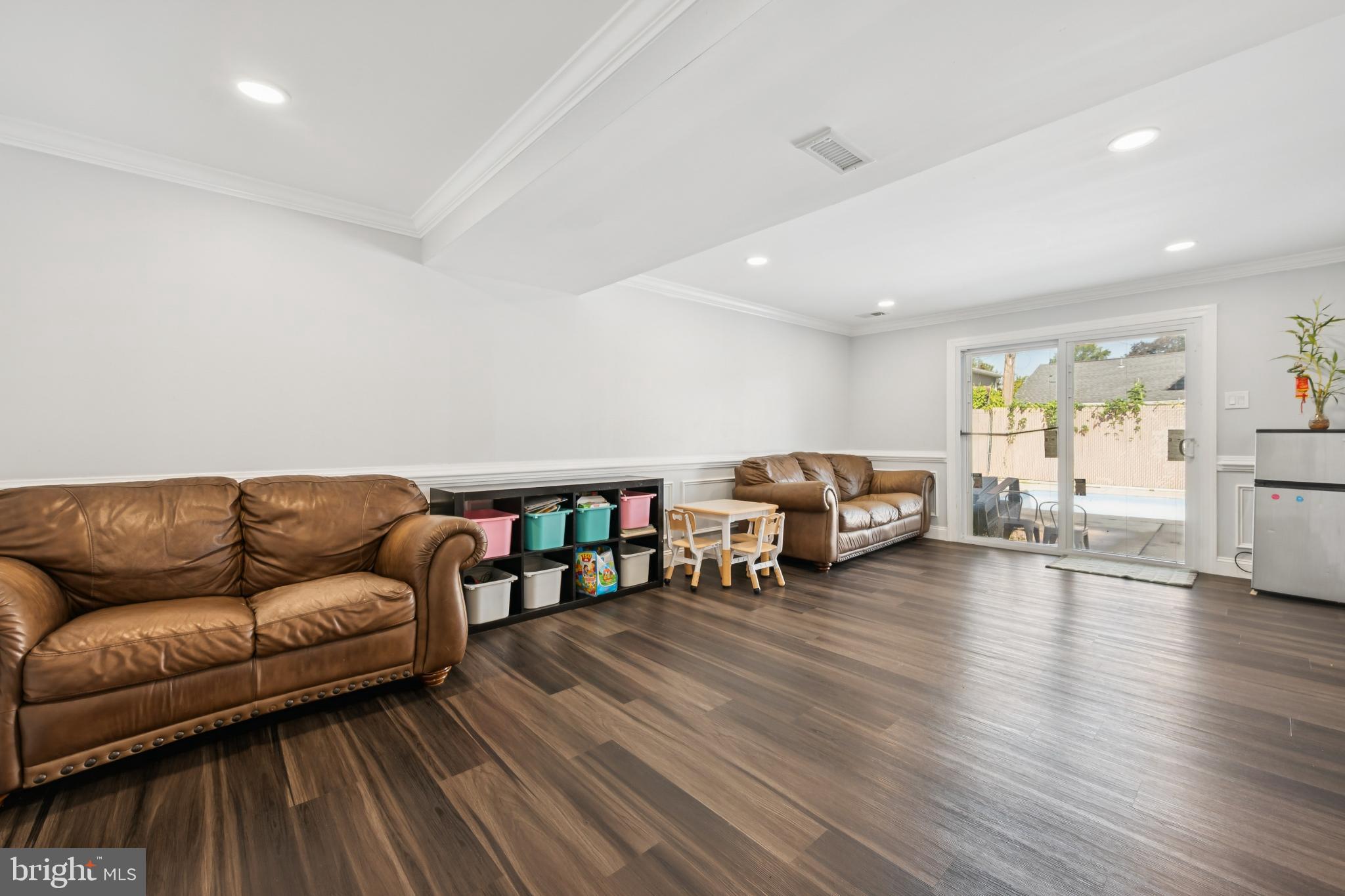 9810 Bridle Road Philadelphia, PA 19115 - Photo 15 of 25 a living room with furniture and a wooden floor