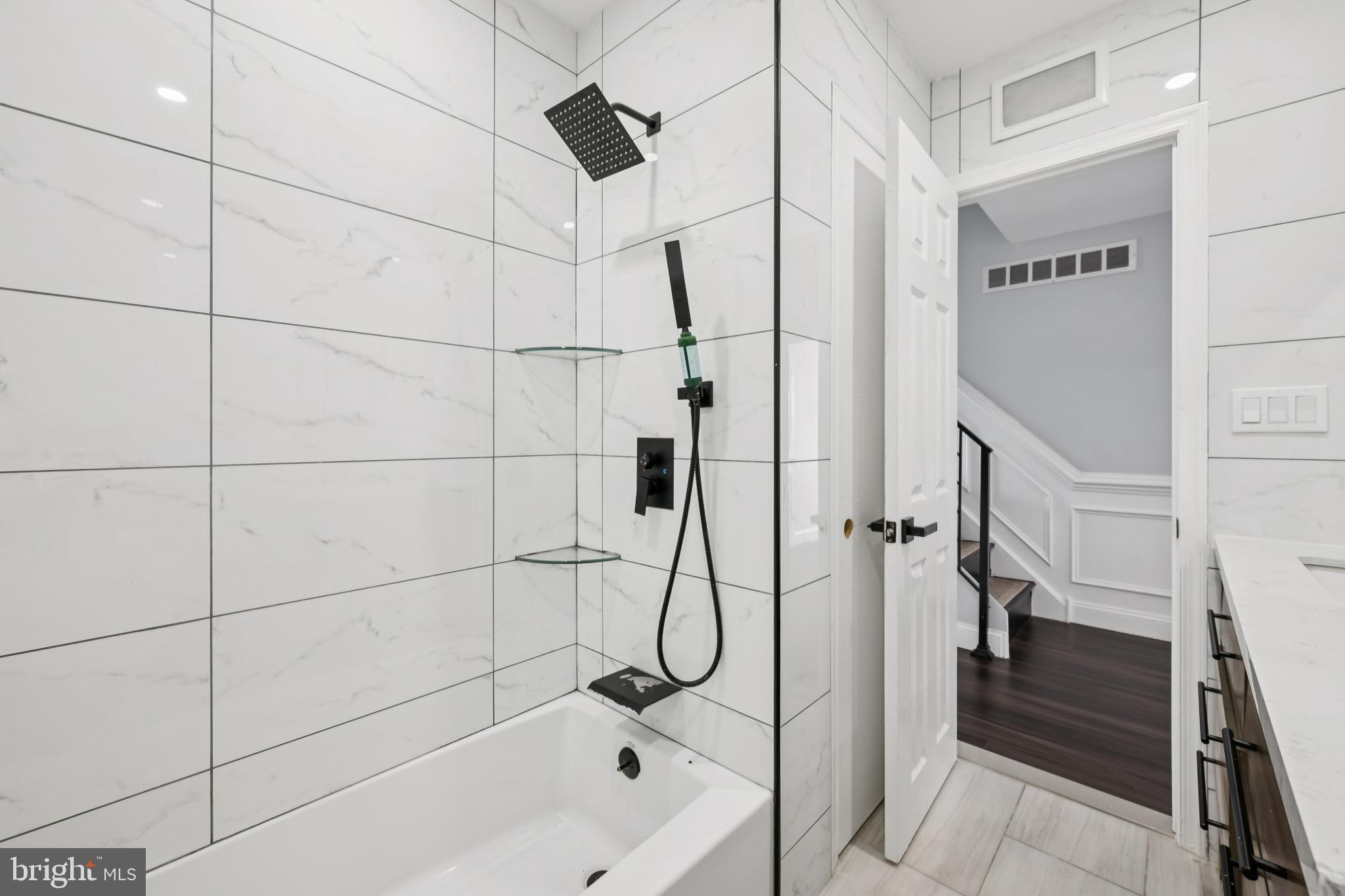 9810 Bridle Road Philadelphia, PA 19115 - Photo 19 of 25 a bathroom with a bathtub and shower