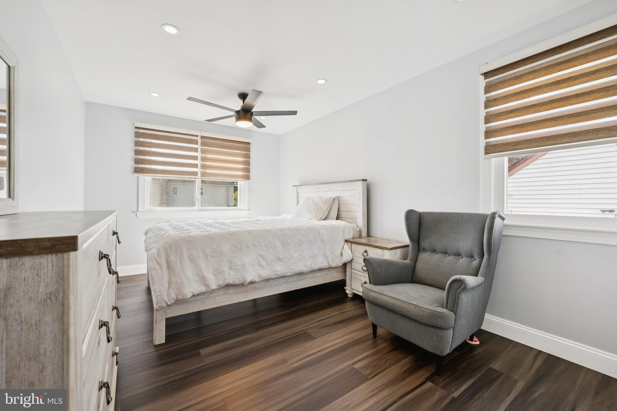 9810 Bridle Road Philadelphia, PA 19115 - Photo 22 of 25 a bedroom with a bed couch and a window