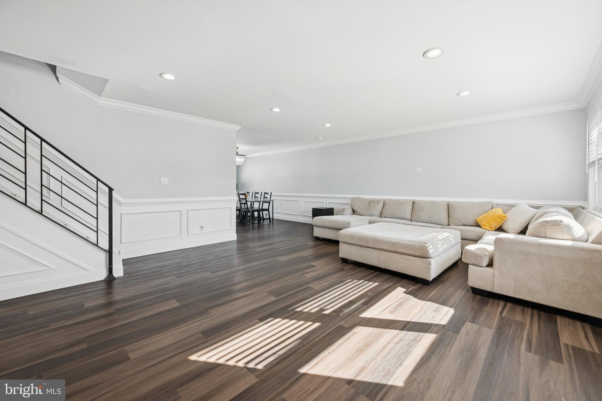 9810 Bridle Road Philadelphia, PA 19115 - Photo 6 of 25 a living room with furniture and a wooden floor