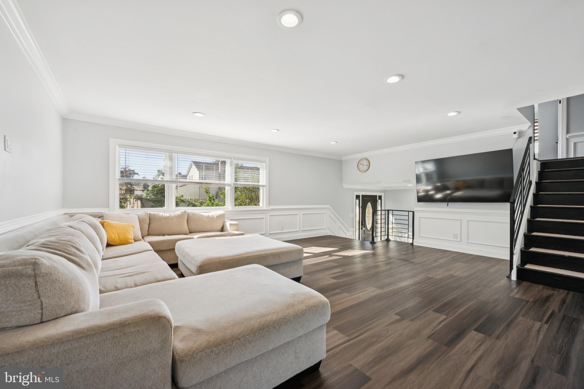 9810 Bridle Road Philadelphia, PA 19115 - Photo 7 of 25 a living room with furniture and a large window
