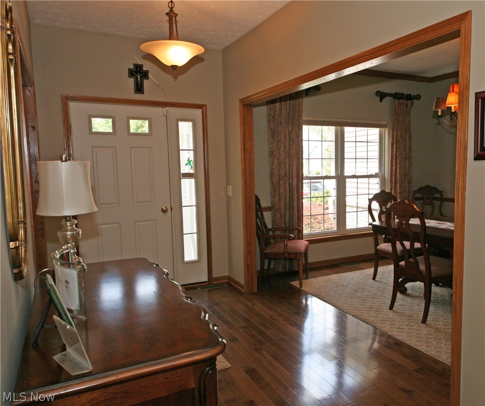 107 Timber Ridge Drive Elyria, OH 44035 - Photo 4 of 34 Entry foyer with hardwood opens to the formal dining room