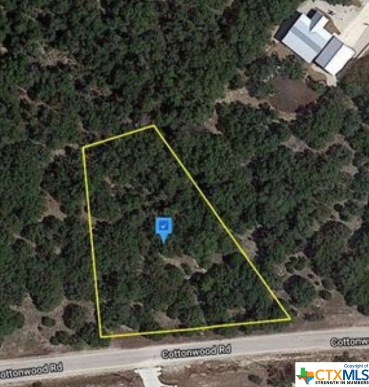 2050 Cottonwood Road Fischer, TX 78623 - Photo 3 of 5 a view of a wooden bridge