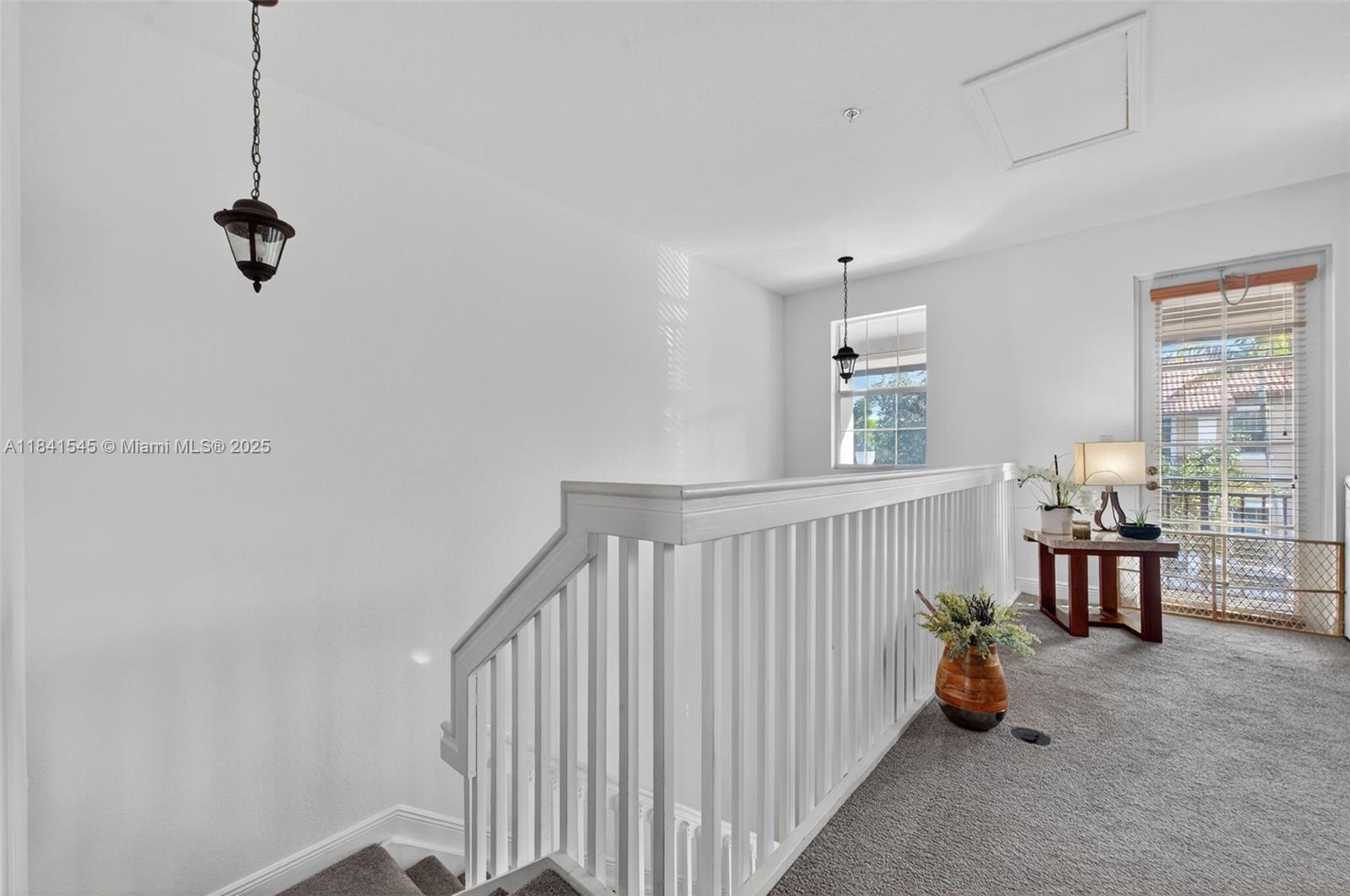 14615 Southwest 14 Street, Unit 14615 Pembroke Pines, FL 33027 - Photo 20 of 49 a bedroom with furniture and a window