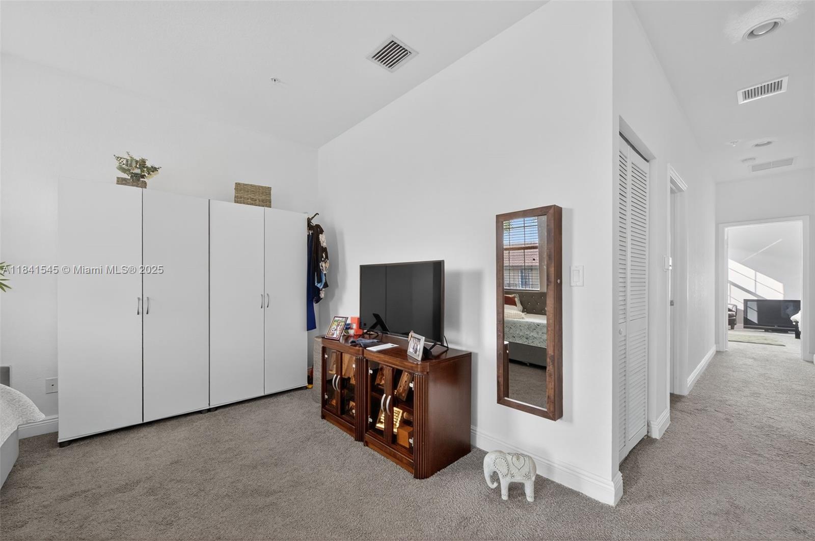 14615 Southwest 14 Street, Unit 14615 Pembroke Pines, FL 33027 - Photo 22 of 49 a view of a livingroom with walk in closet