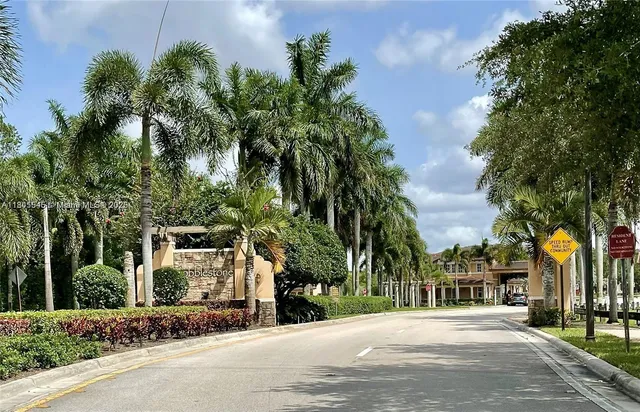 a view of a building with a street