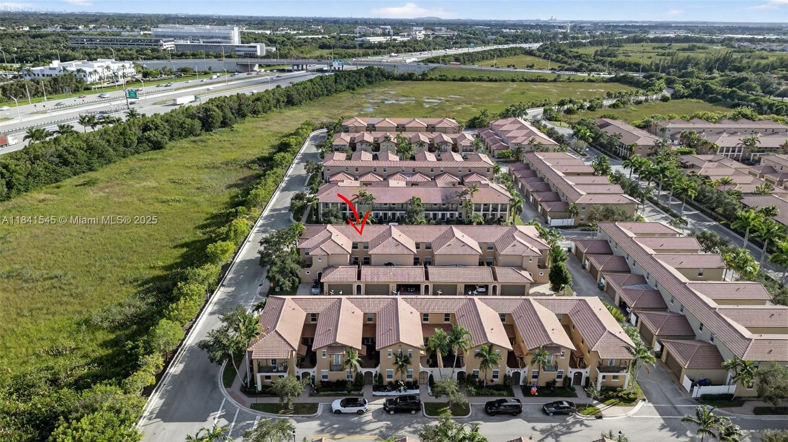 14615 Southwest 14 Street, Unit 14615 Pembroke Pines, FL 33027 - Photo 47 of 49 an aerial view of river residential house with outdoor space and river