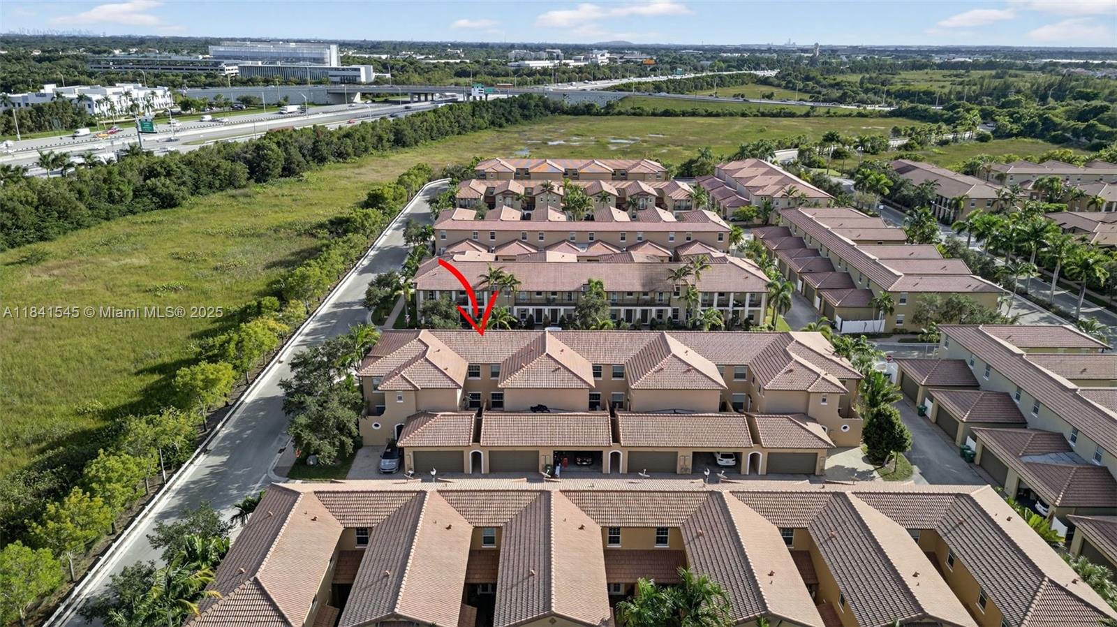 14615 Southwest 14 Street, Unit 14615 Pembroke Pines, FL 33027 - Photo 48 of 49 an aerial view of residential houses with outdoor space and river