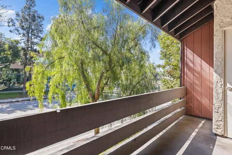 a view of roof with city view