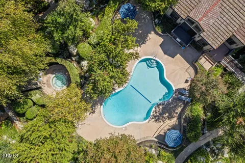 an aerial view of a swimming pool