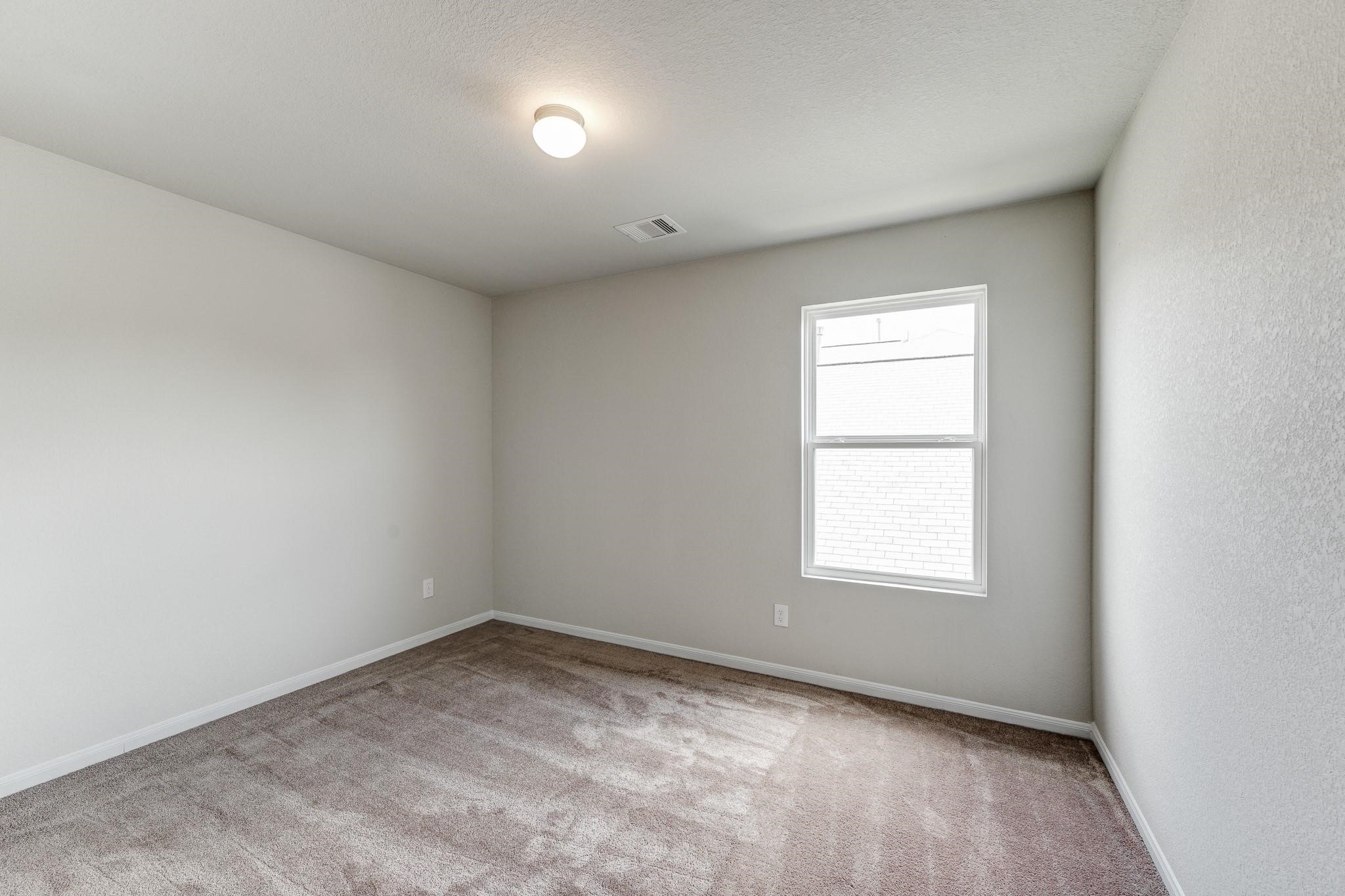 1015 Willowick Road Houston, TX 77090 - Photo 31 of 42 Bedroom #4 offering lots of space for multiple beds or a KING size bed!
