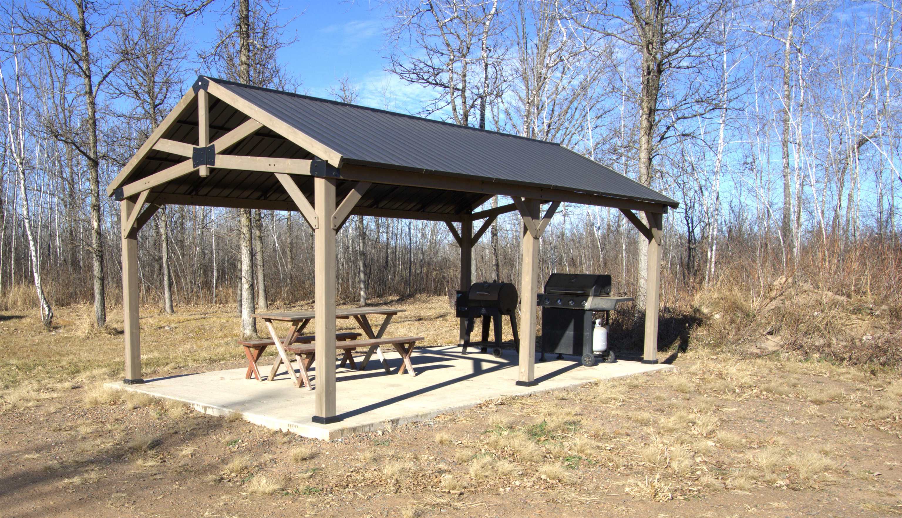 6014 Brown Road Kettle River, MN 55757 - Photo 35 of 54 Surrounding community featuring a patio area and a view of trees