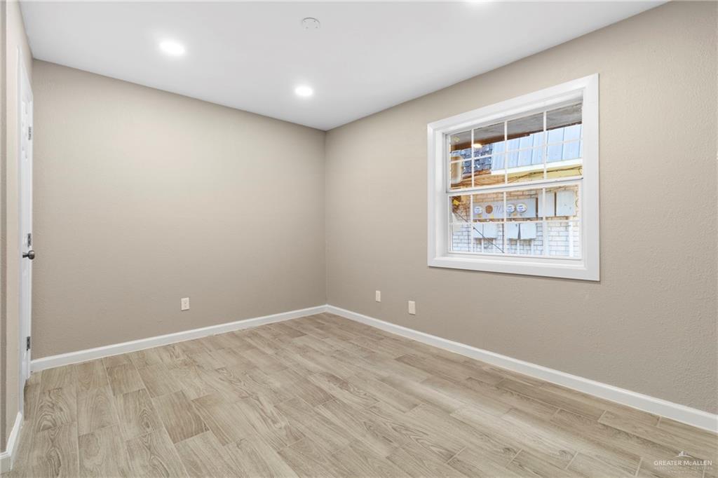 712 Toronto Avenue McAllen, TX 78503 - Photo 8 of 13 wooden floor in a room