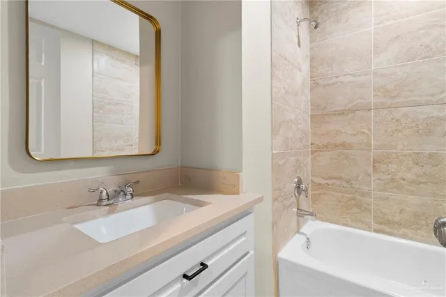 a bathroom with a sink and a bathtub