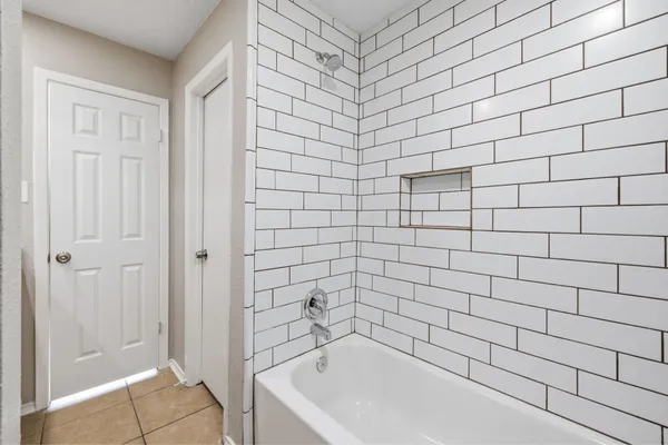 a bathroom with a bathtub