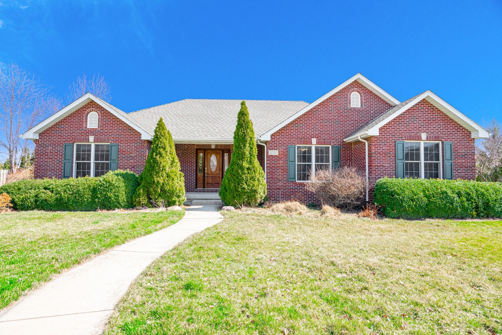 1715 Willow Road Morris, IL 60450 - Photo 1 of 22 a front view of a house with a yard