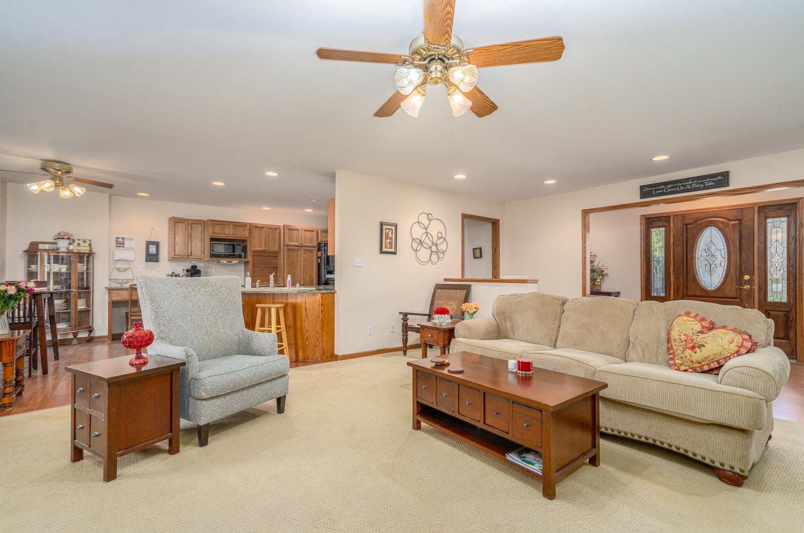 1715 Willow Road Morris, IL 60450 - Photo 3 of 22 a living room with furniture and kitchen view
