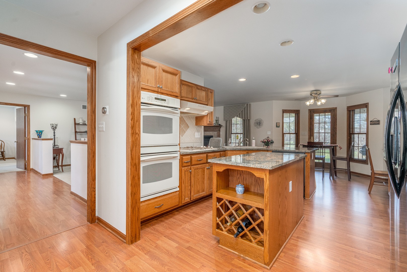 1715 Willow Road Morris, IL 60450 - Photo 4 of 22 a open kitchen with stainless steel appliances granite countertop a stove and a refrigerator