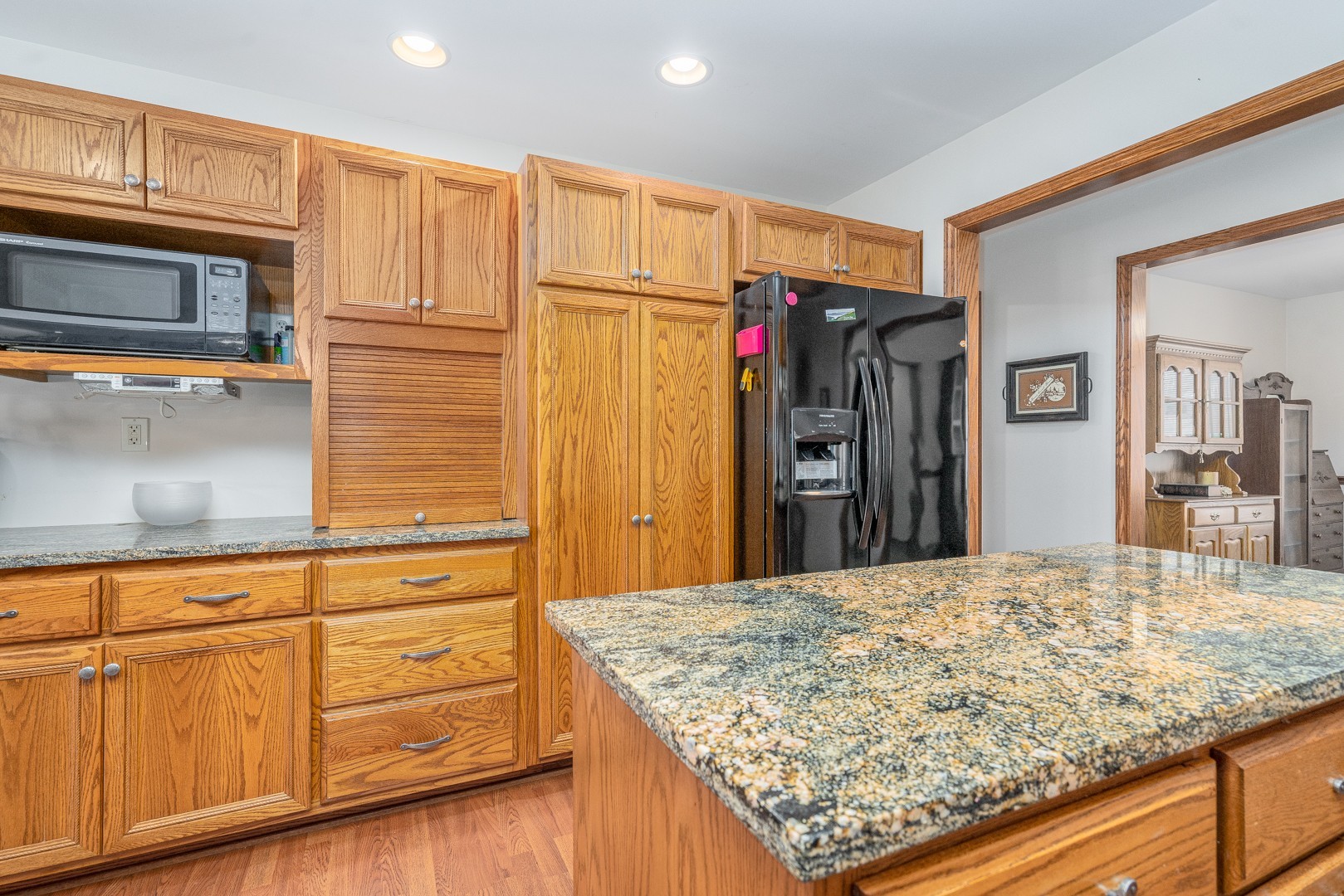 1715 Willow Road Morris, IL 60450 - Photo 6 of 22 a view of a kitchen with cabinets