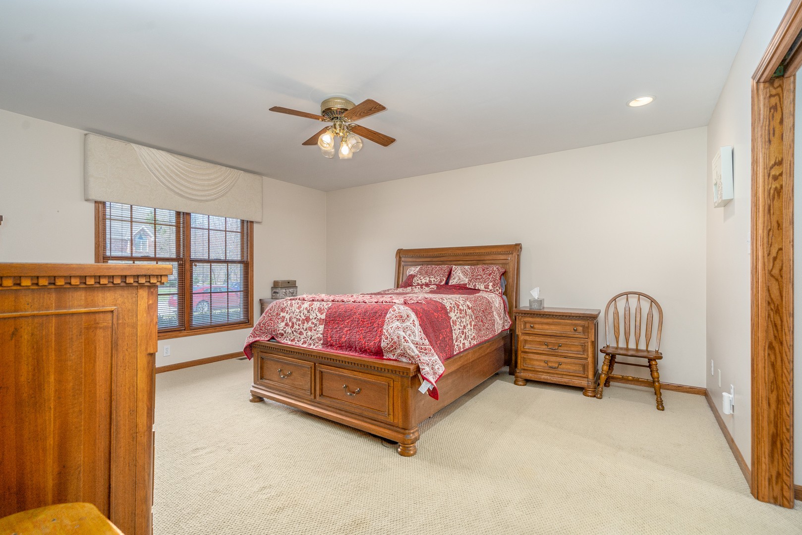 1715 Willow Road Morris, IL 60450 - Photo 9 of 22 a spacious bedroom with a bed and a window