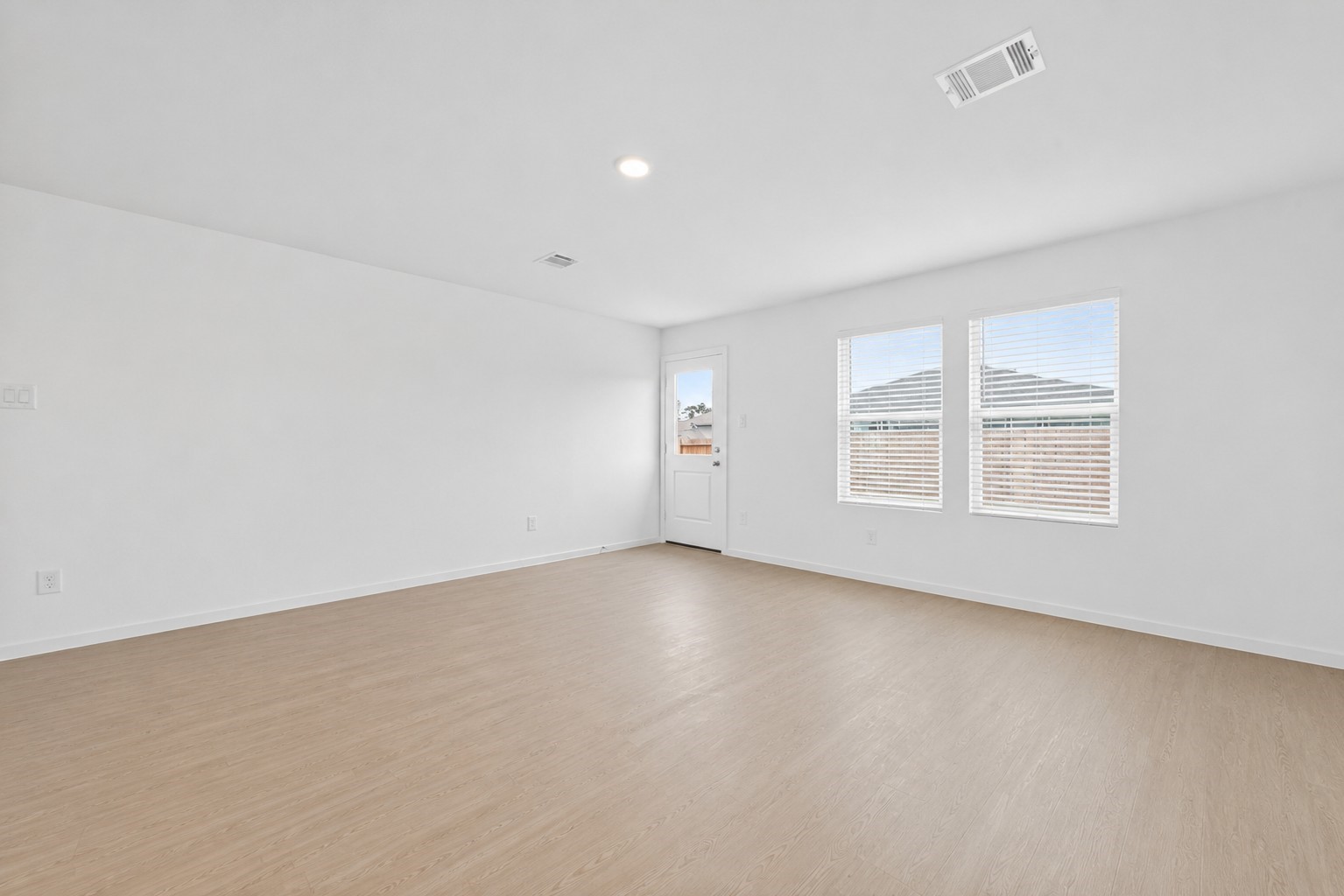 10720 Ellerston Road Cleveland, TX 77327 - Photo 8 of 27 an empty room with windows