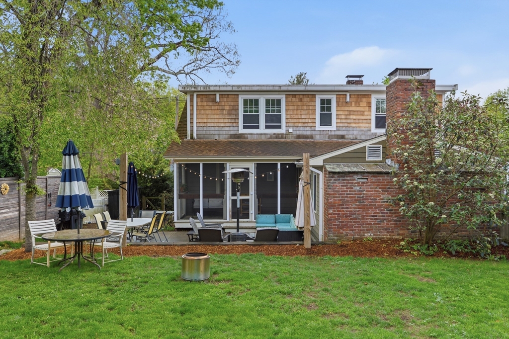 80 Concord Street Maynard, MA 01754 - Photo 28 of 29 a front view of a house with patio