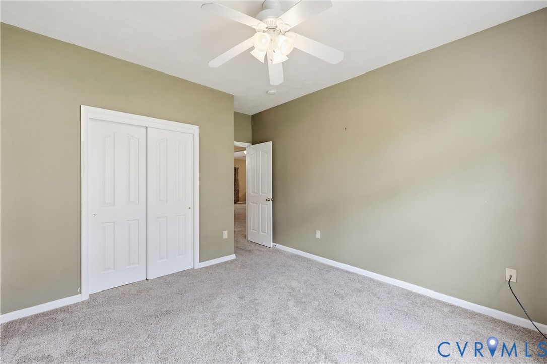 14719 Clover Ridge Lane Chesterfield, VA 23832 - Photo 24 of 36 Soft neutral wall color, plush grey carpet, white