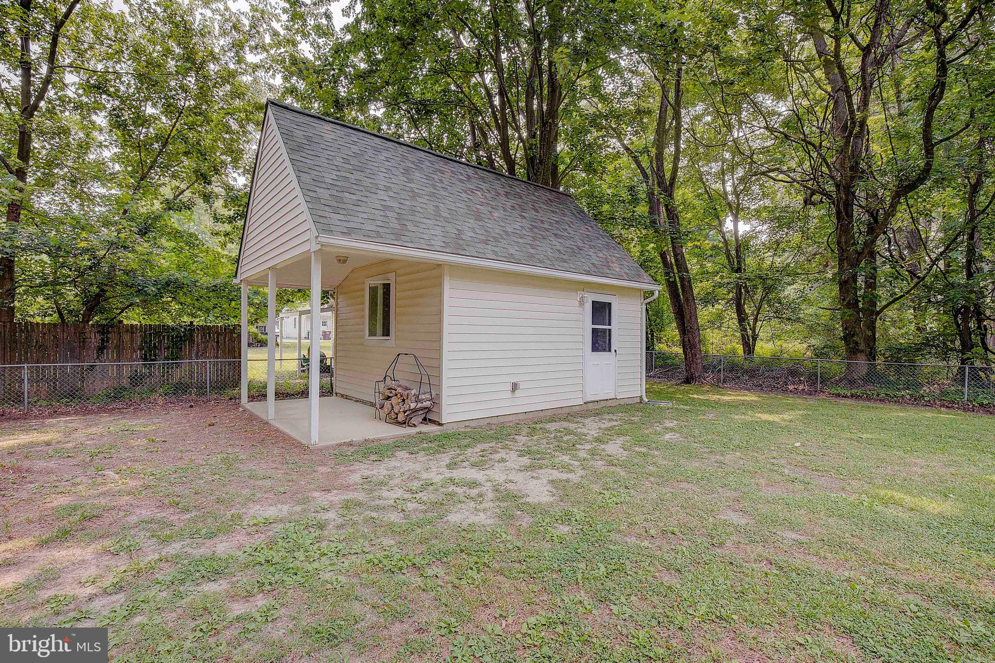 208 Dorchester Road Stevensville, MD 21666 - Photo 27 of 36 Shed has electric and window AC unit