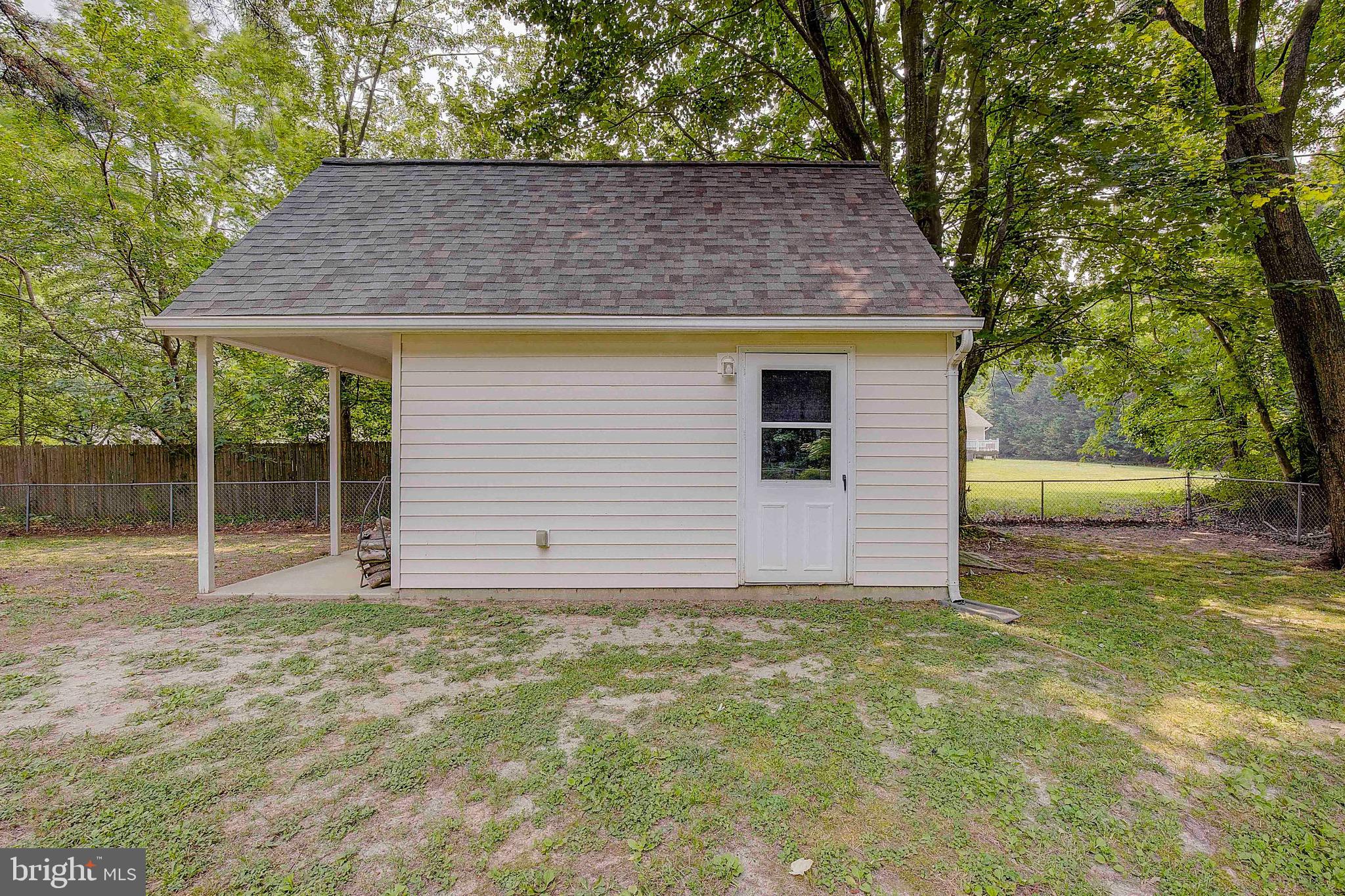 208 Dorchester Road Stevensville, MD 21666 - Photo 28 of 36 Shed has electric and window AC unit