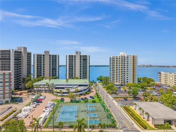 a view of city with tall buildings