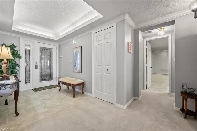 a bathroom with a tub mirror and toilet