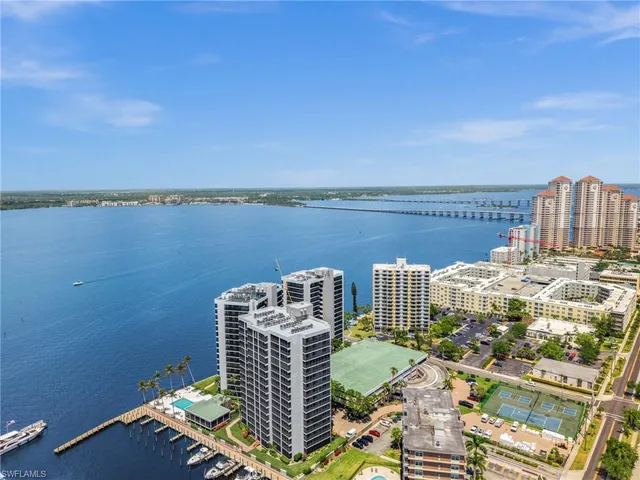 a view of a swimming pool with a lounge chairs
