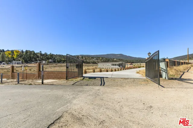 a view of a house with a ocean view