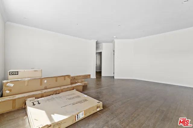 a kitchen with a refrigerator and a sink