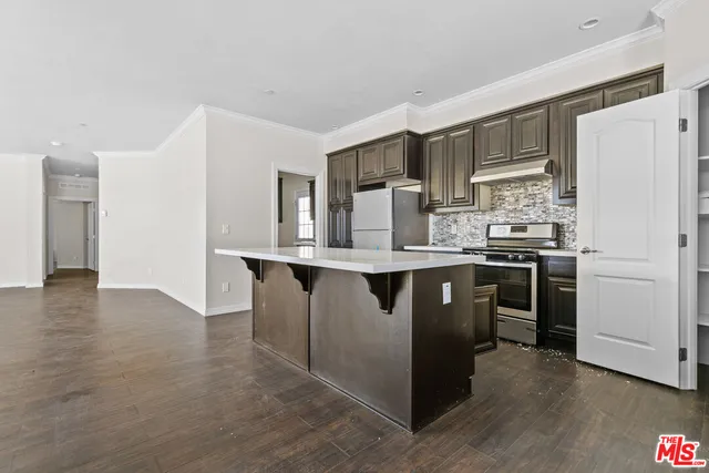 a view of a room with a wardrobe space