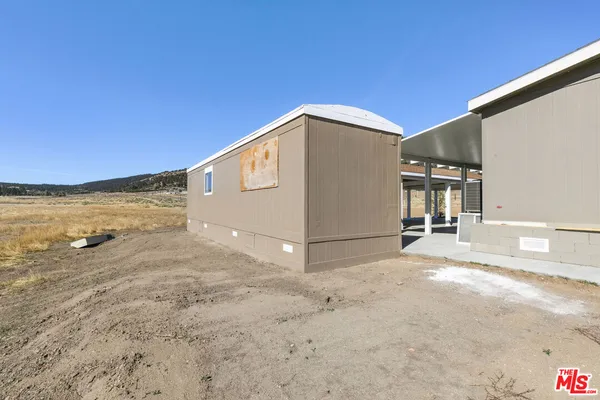 a view of a house with a outdoor space
