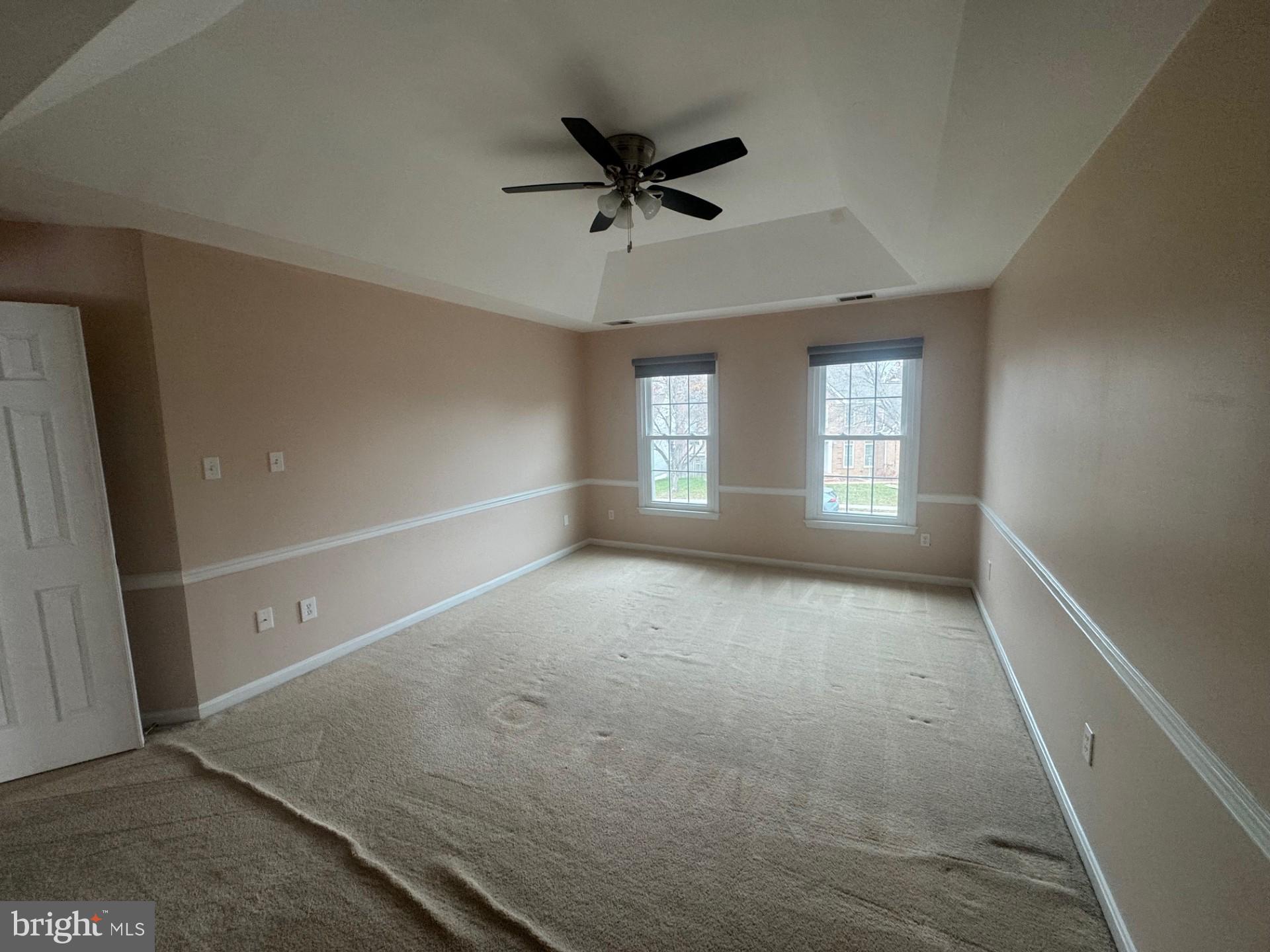 8143 Ridge Creek Way Springfield, VA 22153 - Photo 23 of 42 a view of a livingroom with a ceiling fan and window