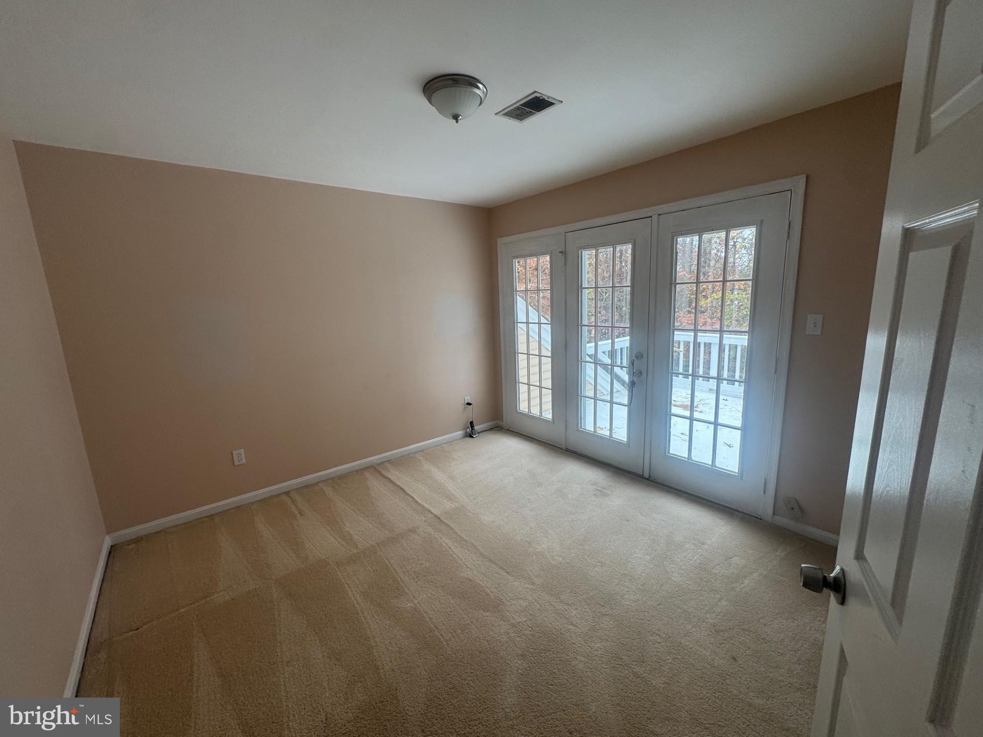 8143 Ridge Creek Way Springfield, VA 22153 - Photo 24 of 42 a view of an empty room with a window