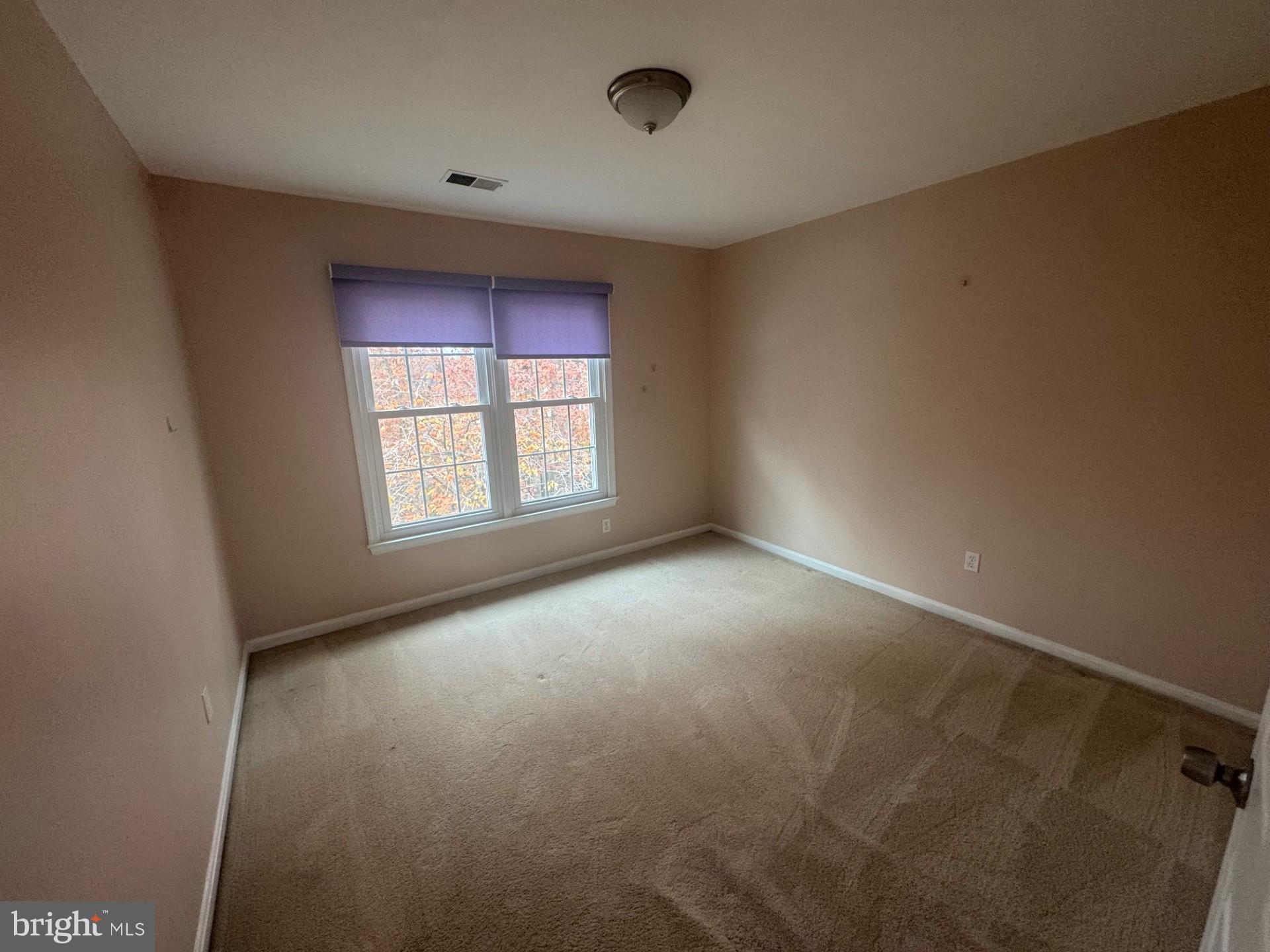 8143 Ridge Creek Way Springfield, VA 22153 - Photo 28 of 42 an empty room with a window